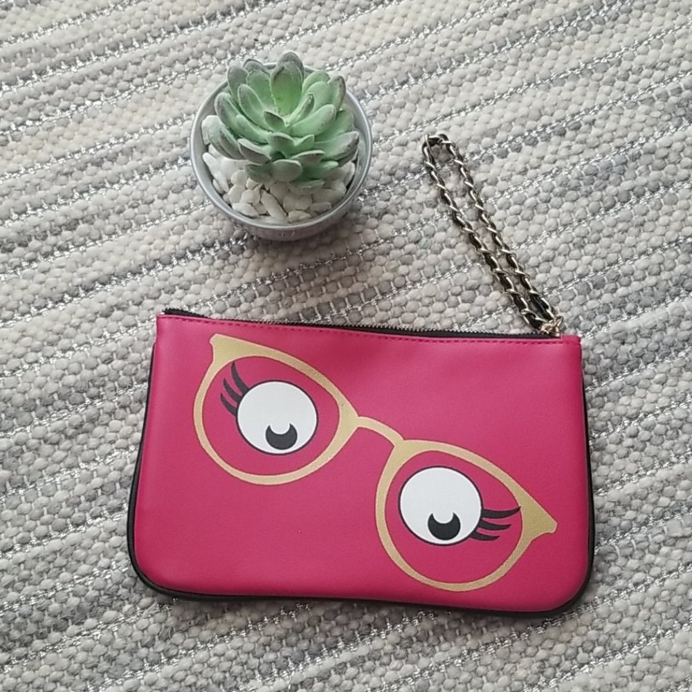 🛍 "Chic & Compact: Kensie  Eyeglass Print Wristlet"